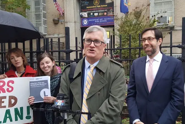Assemblyman Brian Kavanagh speaking at a press conference next to Senator Daniel Squadron in November of 2016